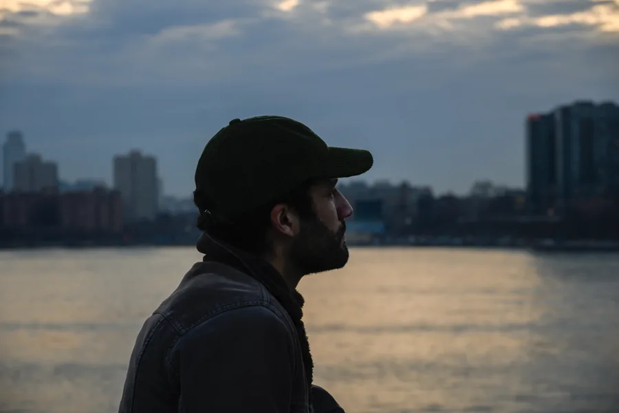 Silhouetted against the water at last light