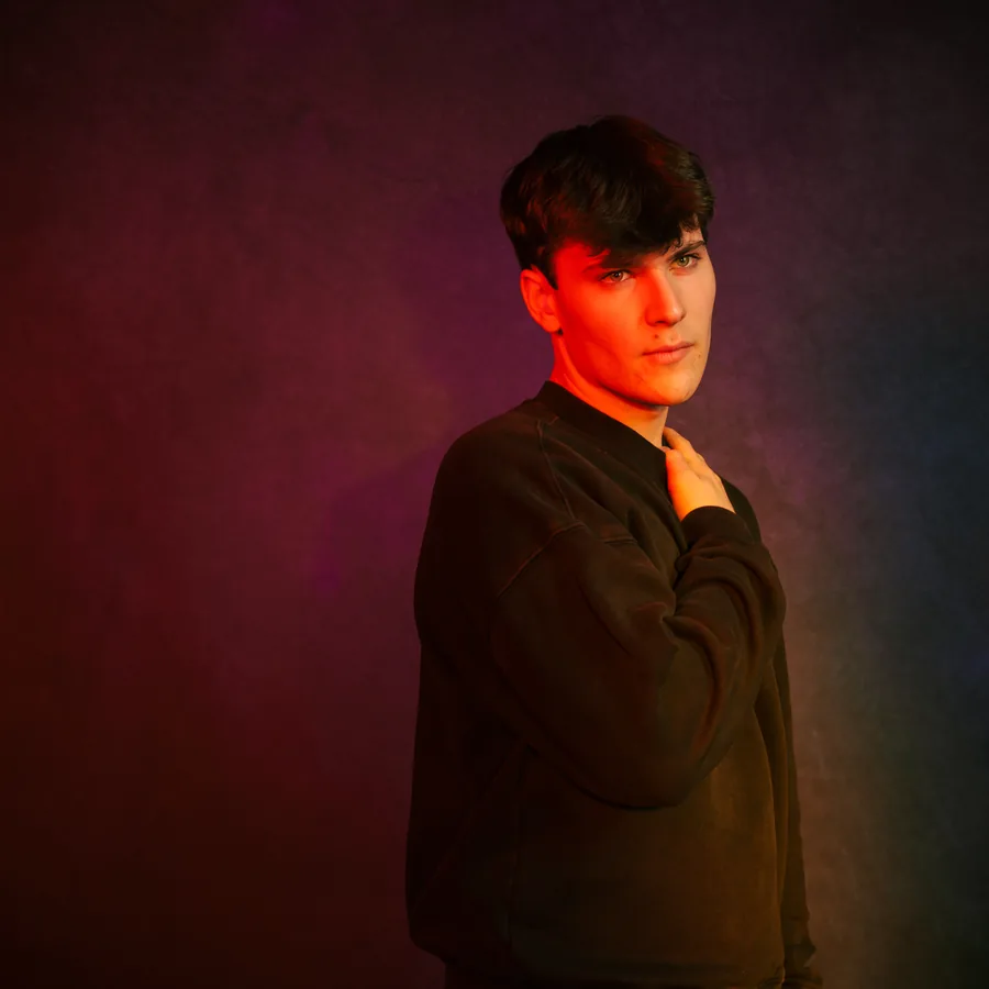 Album portrait lit in red and pink